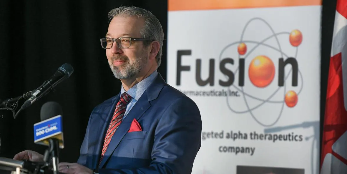 John Valliant with Fusion Pharmaceuticals banner
