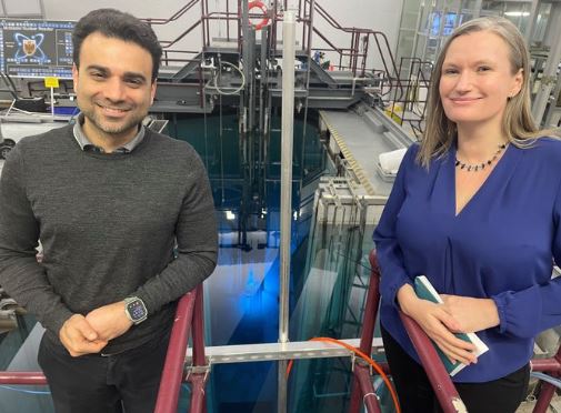 Photo of Professors Sam Sadeghi and Suzanne Lapi inside the Nuclear Reactor Building at McMaster
